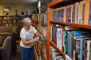 Members enjoy the large library in our Community Center.